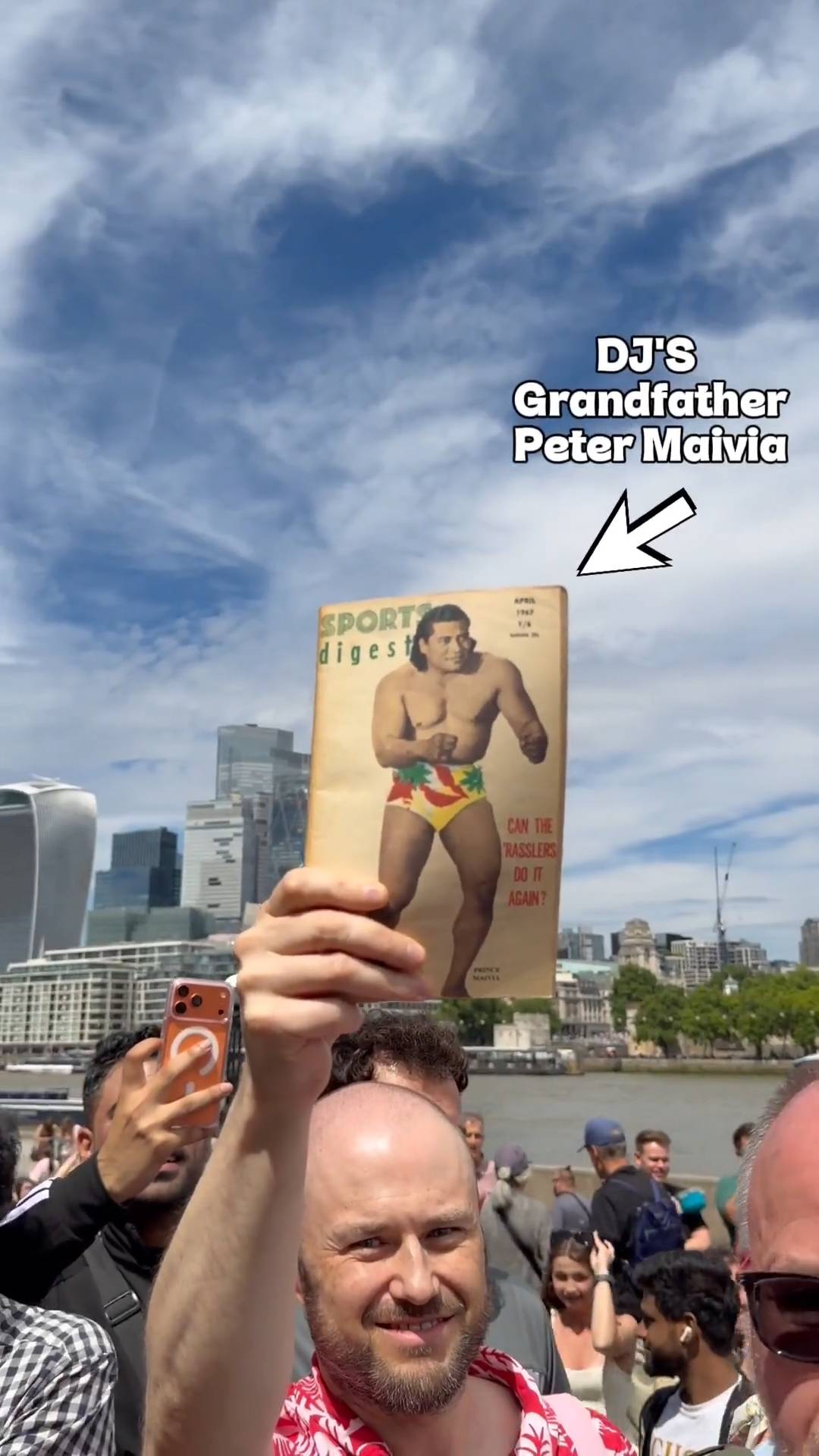 A fan gifts Dwayne Johnson (The Rock) a vintage wrestling magazine with his grandfather Peter Maivia on the cover.